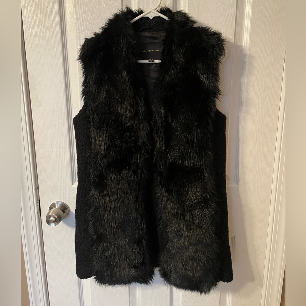 Black faux fur vest